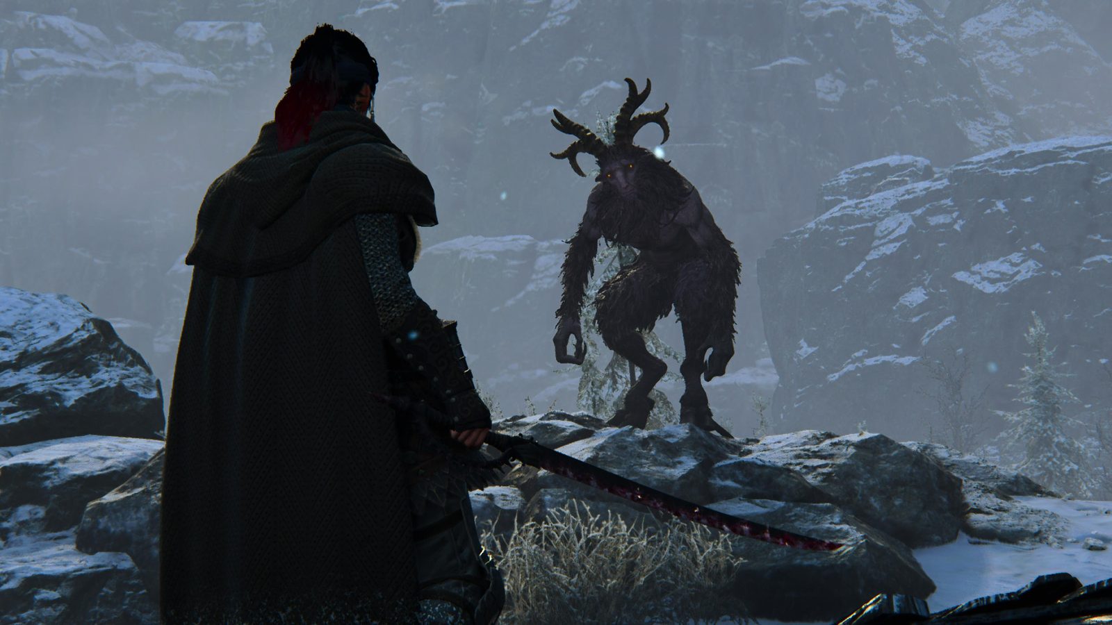 DRAGON'S DOGMA 2: DARK ARISEN, LA VERSION ULTIME DU JEU DE CAPCOM Le personnage, épée au clair, face à une créature cornue aux yeux luisants sur une crête enneigée